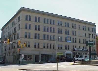 Once a luxury hotel, the building is now mixed-use commercial and residential. 