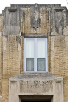 Shows when the school was built and the original name of the school.