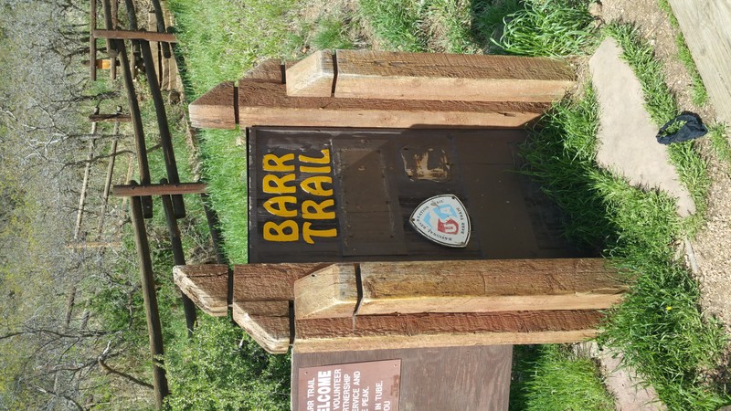 The trail head sign. Hikers can pay $5 for parking at the trail head or they can park down in town and take the shuttle for free. 