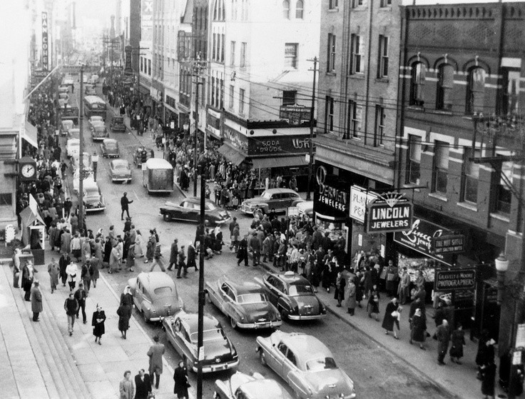 A view of 225 Capitol St. located on the right side of the street circa 1960.