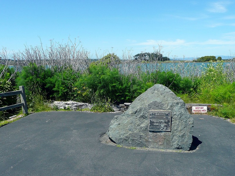 The historical marker is located at the end of the road on the west end of Woodley Island. Indian Island is visible in the background.