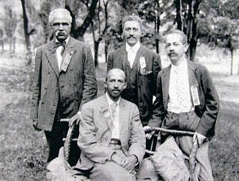 Niagara Movement leaders: W.E.B. Dubois (seated) and (left to right) J.R. Clifford, L.M. Hershaw and F.H.M. Murray. Photo taken at Harper's Ferry on April 17, 1906.