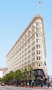 The Phelan Building is a classic example of a flatiron-style building. These buildings get their name from their resemblance to the triangular clothes iron of the time period. The shape provided an efficient design for triangular intersections.