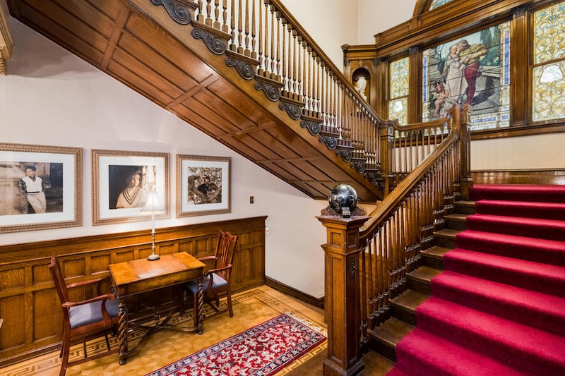 Staircase featuring woodwork