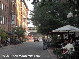  Laclede's Landing, a nine - block industrial area that once housed companies producing coffee, leather goods, mattresses, tobacco, whiskey, candy and machinery for the barges, features some of the most unique restaurants, sidewalk cafes and clubs.