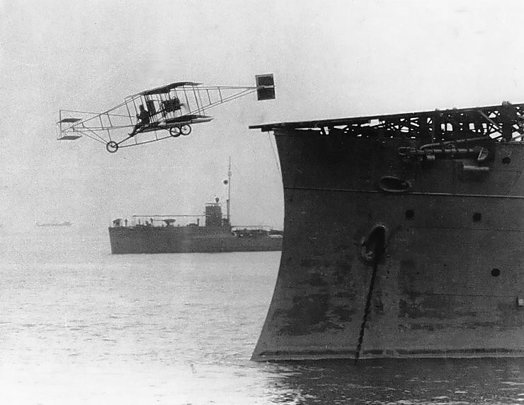 Eugene Ely's historic first flight from the deck of a ship. Library of Congress.