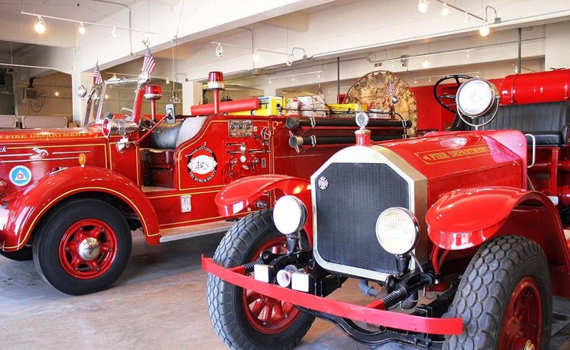 Two of the antique fire trucks at the museum, which opened in 2013.