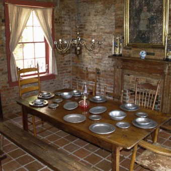 Above the brick kitchen, seen in the picture, were rooms for the enslaved individuals who worked in the house.