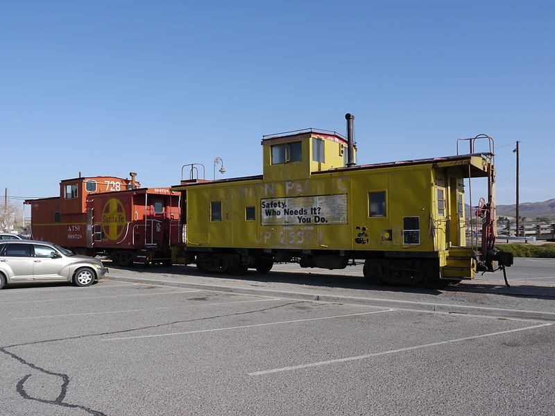 Two of the several train cars located at the museum