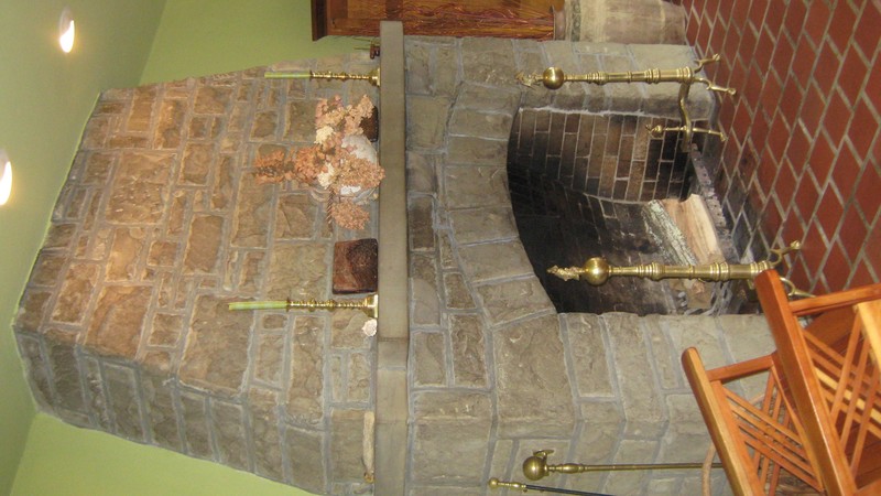 The home's stone fireplace was added as part of the Sidney Day additions in 1923.