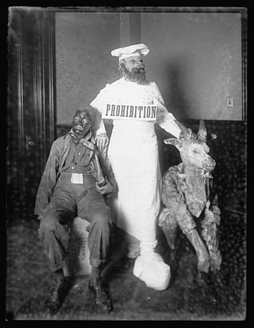 This is an example of the racist push for prohibition. Prohibition can be seen stopping the Black people from drinking. Prohibition is also holding back an animal which is a depiction of the poor whites who drank. The idea was that keeping these people from drinking would lead to a more harmonious society.