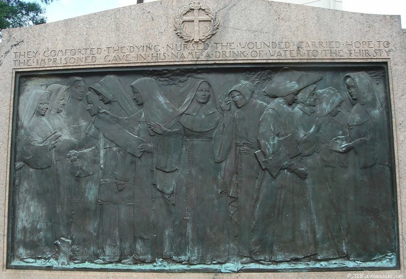 Close up of the memorial's front, which depicts 12 Catholic sisters. Nuns first served in an officially-recognized (and much praised) battlefield capacity with Florence Nightingale during the Crimean War of the 1850s. 