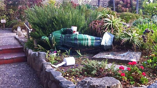 A statue of Padre Junipero Serra toppled at Mission San Carlos after his canonization in 2015.