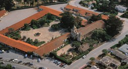 Bird's eye view of mission. The "quadrangle" to let of the basilica had to be rebuilt through painstaking restoration--the original was destroyed in the 1800s.