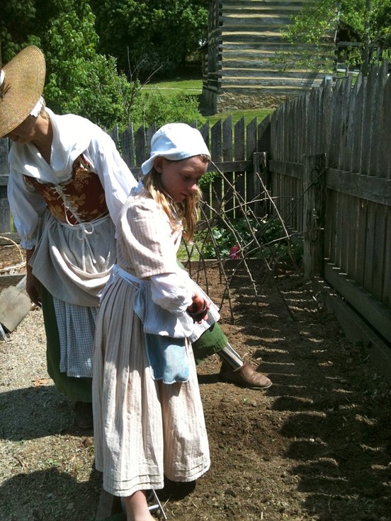 Re-enactors depicting 18th century dress and daily life.