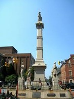 The Soldiers and Sailors Monument. The four statues of men representing the four branches of American armed services. The Navy, the Army, Artillery, and U.S. Cavalry. 