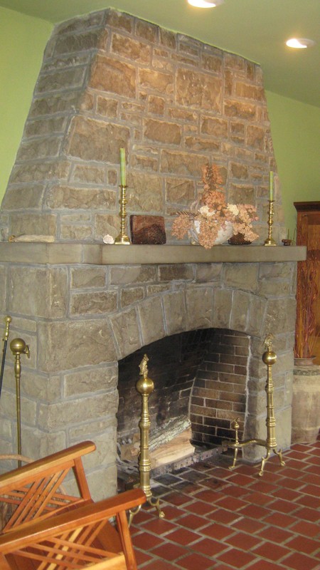 The home's fireplace, part of additions by notable architect Sidney Day in 1923, is still in use.