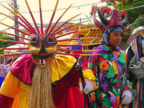 National costumes of the island that are used for the festivals. The masks of the costumes are made of the hard part of coconuts.