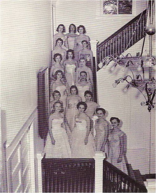 The 1959 Greenbrierettes, a select vocal group, standing on the foyer staircase in Carnegie Hall. 