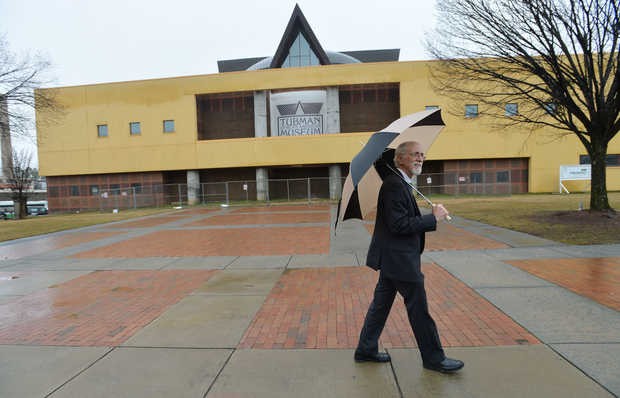 The present day Tubman Museum. Current director Andy Ambrose is pictured walking in front of the building. Photo courtesy of Beau Cabell, The Telegraph (Macon, GA). 