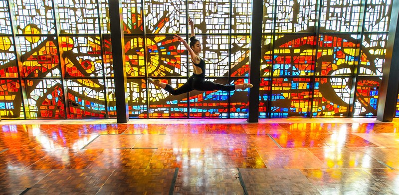 A dancer performs in the Jewel Box.