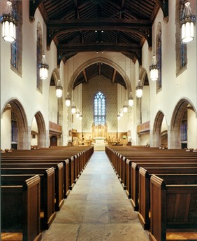 The sanctuary features features ornate stained stained glass windows brought to the city from a Boston manufacturer who designed the windows of many other leading church edifices.