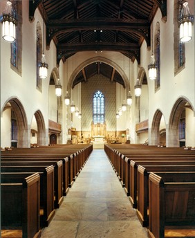 The sanctuary features features ornate stained stained glass windows brought to the city from a Boston manufacturer who designed the windows of many other leading church edifices. 