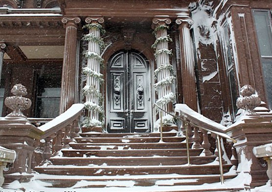 Front door of the mansion in winter