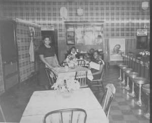 undated photo of Ms. Mayme Martin inside hotel's resturant