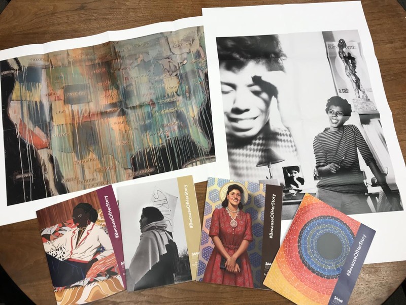 Photo of a collage of various artists ephemeral materials, including a card of Alma Thomas's, The Eclipse, 1970.