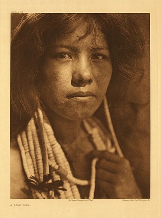 A woman of the Pomo tribe as photographed by Edward S. Curtis in 1924. The Pomo and Miwok peoples lived near the mission and comprised most of San Rafael's neophytes.