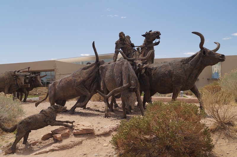 This sculpture, located just outside the museum, depicts a cowboy and his dog gathering cattle.