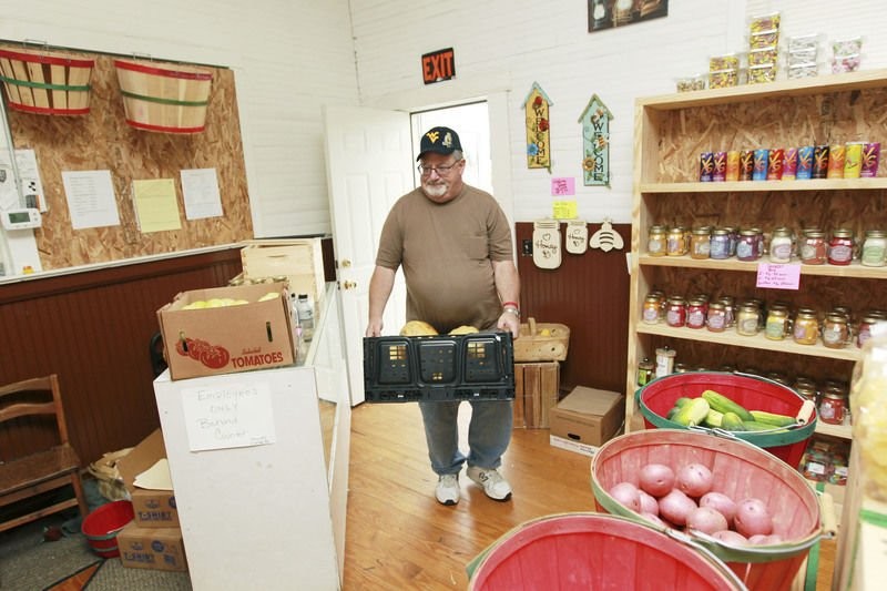 Owner John Breneman II brings in fresh produce. His establishment, Depot Produce & More, has leased the former rail station since 2015.