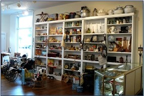 The Monroe 1910 House-The museum shows shelves holding dry goods and other items as they would have been displayed.