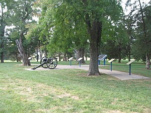 Cannon at Loose Park. Replica artillery also serve as markers for important locations in the Battle of Westport.