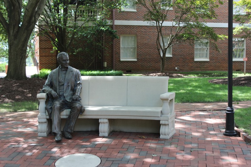 The eponymous William Peace.  Sculpture dedicated in 2007 for the school's sesquicentennial.