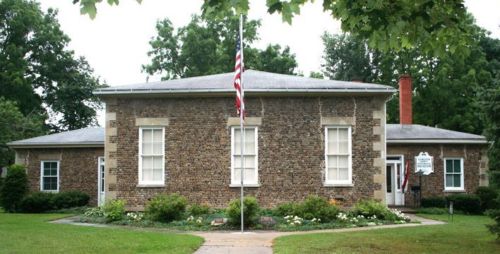 The Livingston County Historical Museum is located in this former 1838 cobblestone schoolhouse. 
