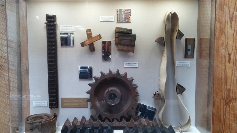 Gears and belts used at Yates Mill. Display located at the A.E. Finley Center.