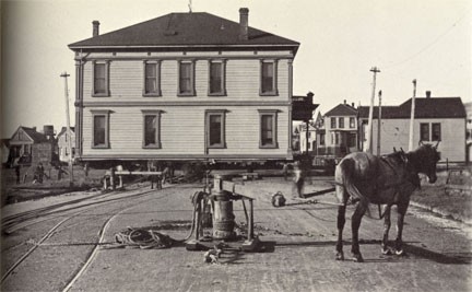 An older city hall building, which was built in 1883 at another location, burned down in a fire