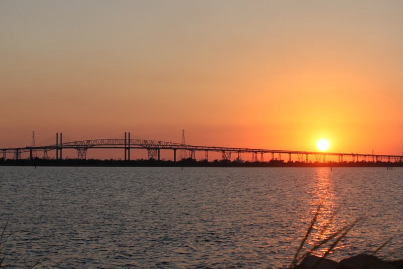 "Rainbow Bridge Sunset" by Blakemul - canon t1i. Licensed under CC BY-SA 3.0 via Wikimedia Commons - https://commons.wikimedia.org/wiki/File:Rainbow_Bridge_Sunset.jpg#/media/File:Rainbow_Bridge_Sunset.jpg