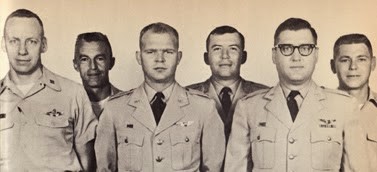 Pilot Major Willard Palm (front left), and Ravens (back row): Major Eugene Posa, Captain Oscar Goforth and Captain Dean Phillips.  Bruce Olmsted is center, John McKone is front right.