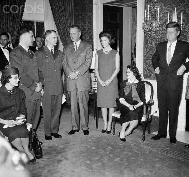 Captains John McKone, Bruce Olmstead, and their wives are honored at the White House with Vice President Lyndon B. Johnson, First Lady Jacqueline Kennedy, and President John F. Kennedy