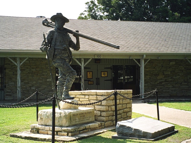 Museum entrance. Statue features George Erath, Texas Ranger and surveyor of the Waco