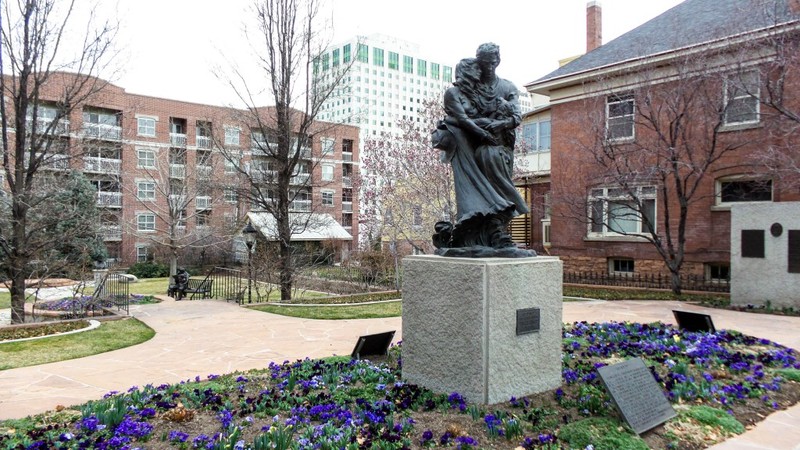 Mormon Pioneer Memorial. Depicts a young pioneer couple burying a child while trekking west