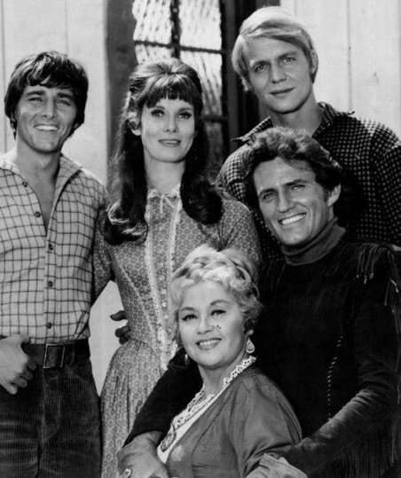 Actors Bobby Sherman, Bridget Hanley, David Soul, Robert Brown, and Joan Blondell from the comedy Western Here Come the Brides. The series loosely depicts the Mercer Girls’ journey to Seattle and aired from September 25, 1968 to April 3, 1970. 