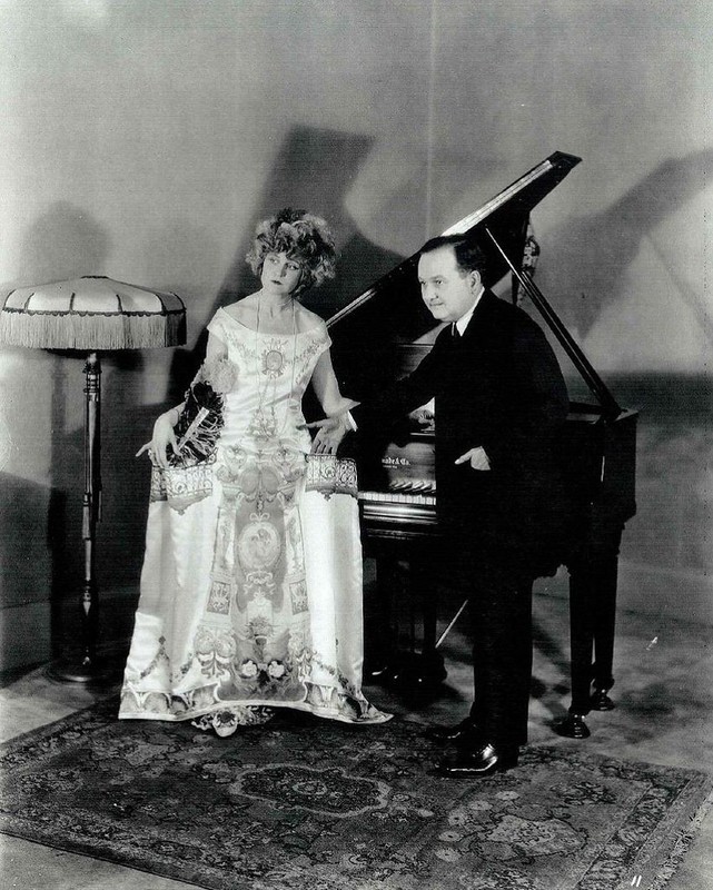 piano, dress, carpet, fashion, man, woman, black and white 