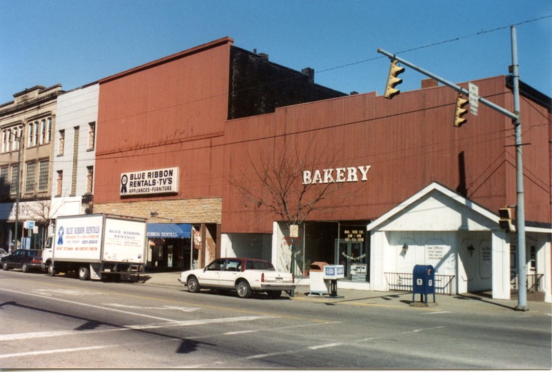 The Koch Building, in this 1980s photo, is pictured on the far left and was known as the Sears store for many years
