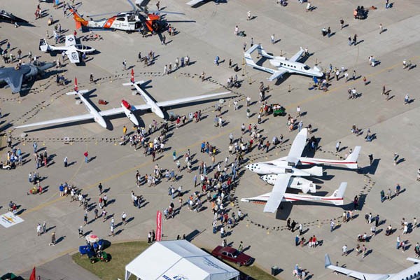 Aerial view of some of the aircraft on display during an AirVenture gathering.