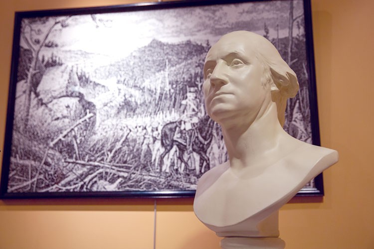 Bust of George Washington with artwork in the background. Washington gained valuable combat and leadership experience during the French and Indian War, which would serve him well leading the Continental Army twenty years later.