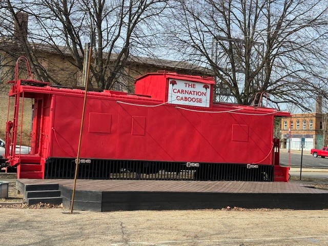 Main Street Caboose renamed "The Carnation Caboose" pictured after renovation from fire damage, 2024